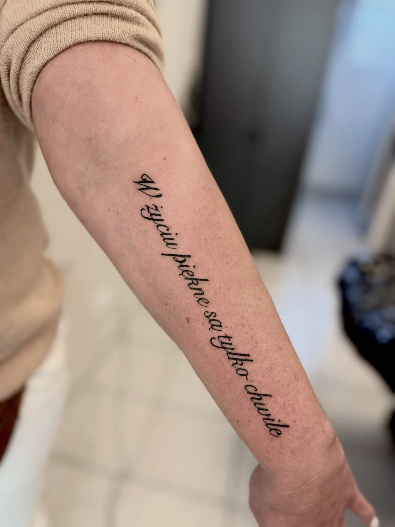 Schriftzug Tattoo